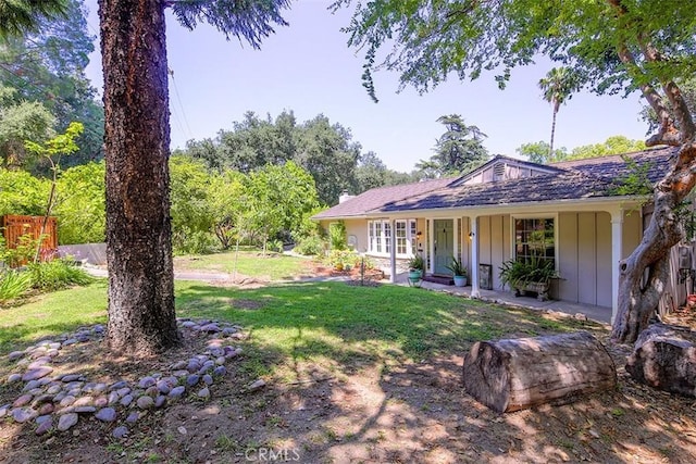 2450 Hermosita Dr, Glendale, CA 91208 - view of yard featuring a porch