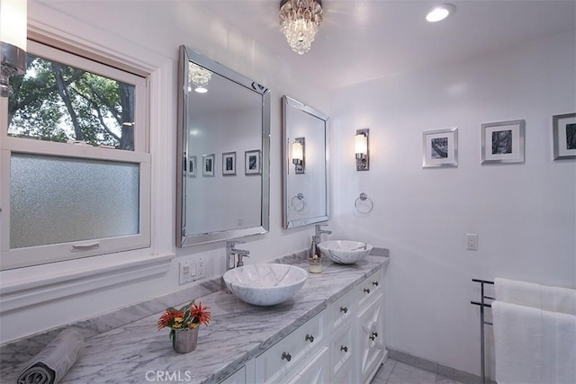 2450 Hermosita Dr, Glendale, CA 91208 - full bath featuring double vanity, tile patterned floors, recessed lighting, and a chandelier