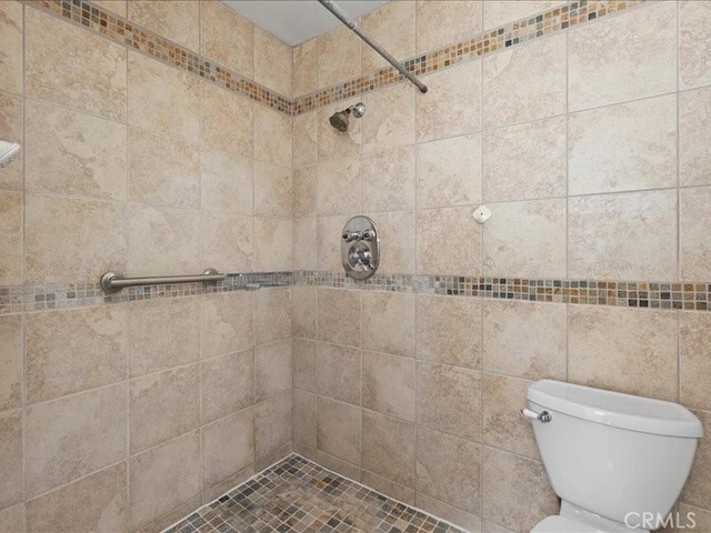 19025 Windridge Ln, Huntington Beach, CA 92646 - full bath with a tile shower and toilet