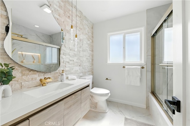 13021 Killion St, Sherman Oaks, CA 91401 - full bath featuring vanity, combined bath / shower with glass door, and marble finish flooring