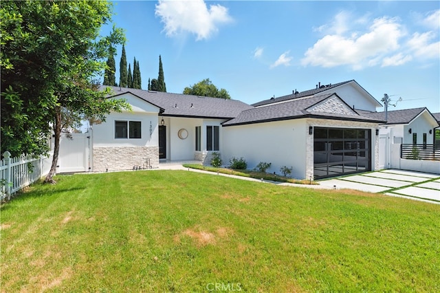 13021 Killion St, Sherman Oaks, CA 91401 - view of front of home featuring an attached garage, stucco siding, a shingled roof, driveway, and stone siding