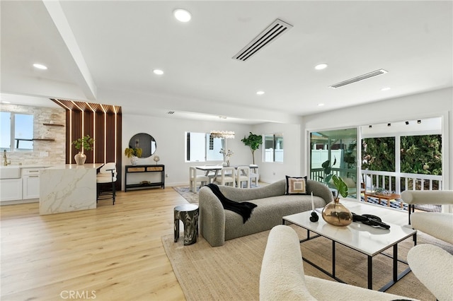 13021 Killion St, Sherman Oaks, CA 91401 - living room with light wood-style flooring and recessed lighting