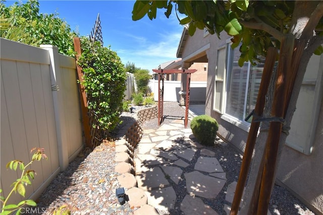 19485 Tor Hill Ln, Apple Valley, CA 92308 - fenced backyard with a patio area