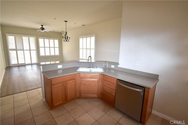 19485 Tor Hill Ln, Apple Valley, CA 92308 - kitchen featuring dishwasher, open floor plan, light countertops, and ceiling fan