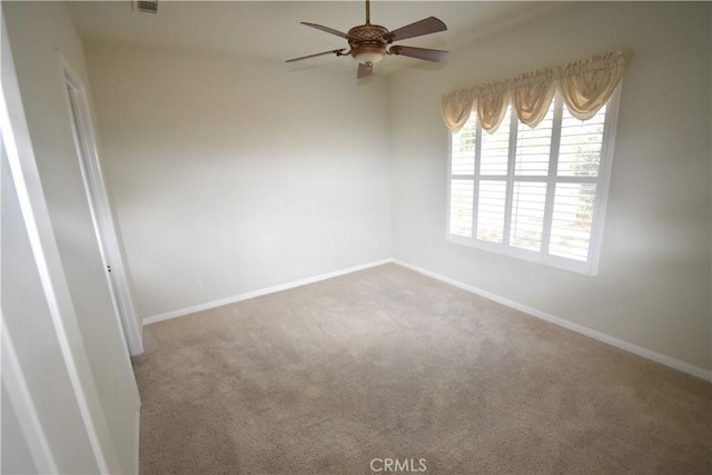 19485 Tor Hill Ln, Apple Valley, CA 92308 - carpeted spare room with baseboards and ceiling fan