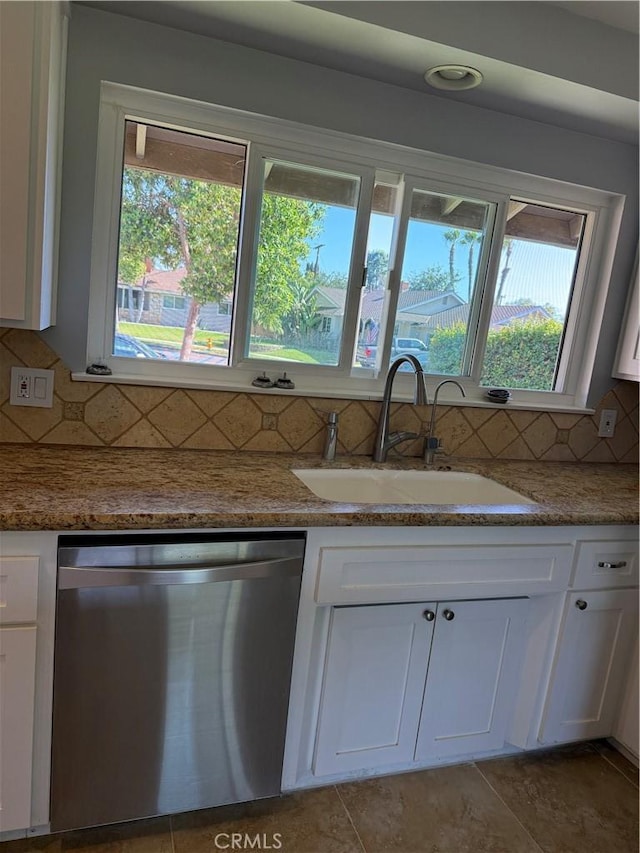 4561 Mimosa Dr, Yorba Linda, CA 92886 - kitchen with stainless steel dishwasher, white cabinetry, and healthy amount of natural light