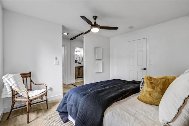 25611 Quail Run Unit 77, Dana Point, CA 92629 - bedroom featuring light wood-type flooring, ceiling fan, and ensuite bath