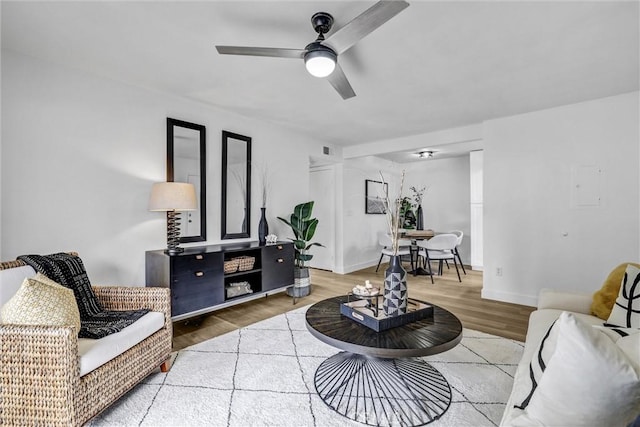 25611 Quail Run Unit 77, Dana Point, CA 92629 - living room featuring ceiling fan and wood finished floors