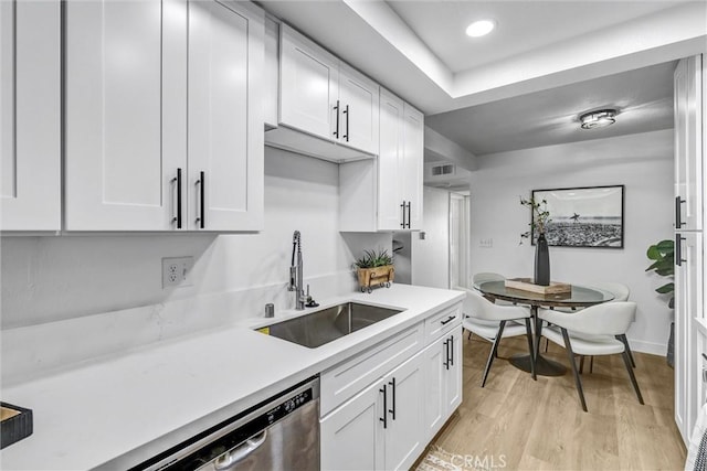25611 Quail Run Unit 77, Dana Point, CA 92629 - kitchen featuring light countertops, white cabinetry, light wood-style flooring, dishwasher, and recessed lighting