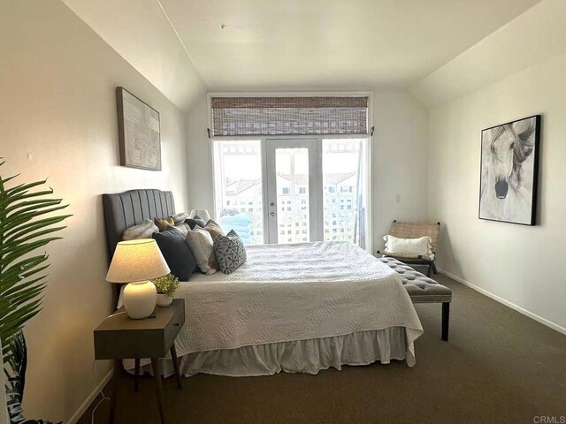 3998 Nobel Dr Unit 302, San Diego, CA 92122 - bedroom featuring lofted ceiling and carpet flooring