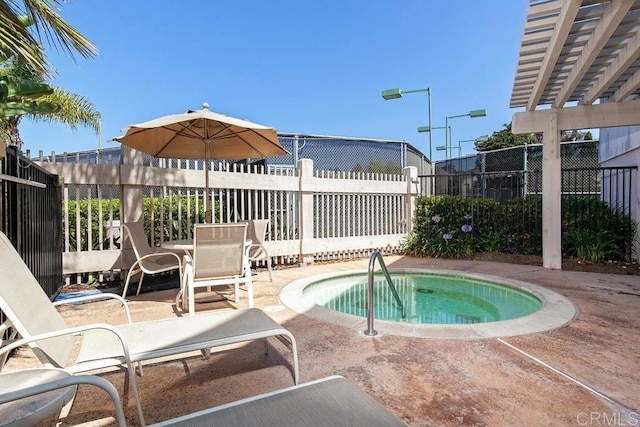 3998 Nobel Dr Unit 302, San Diego, CA 92122 - view of swimming pool with a hot tub, a patio area, and a pergola