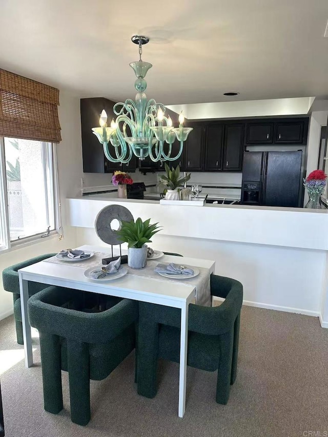 3998 Nobel Dr Unit 302, San Diego, CA 92122 - carpeted dining area with a chandelier