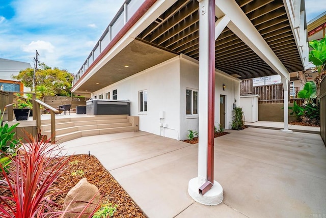 231 5th St, Encinitas, CA 92024 - view of side of property featuring stucco siding and a patio