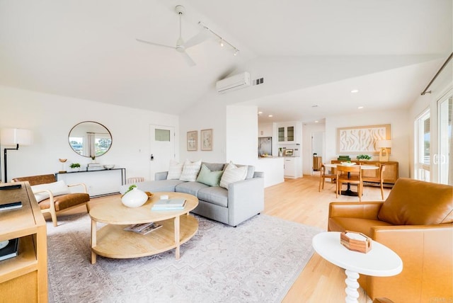 231 5th St, Encinitas, CA 92024 - living area with a wall mounted air conditioner, light wood-style flooring, track lighting, a ceiling fan, and recessed lighting