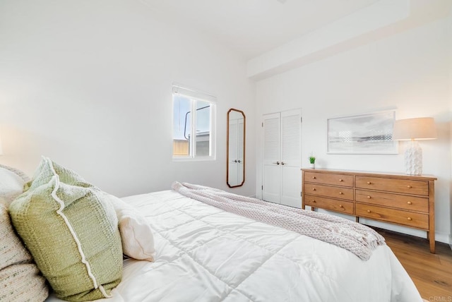 231 5th St, Encinitas, CA 92024 - bedroom with wood finished floors and a closet