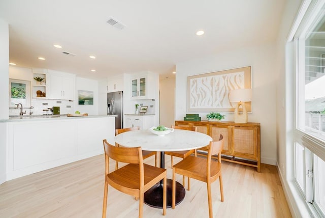 231 5th St, Encinitas, CA 92024 - dining room featuring light wood-style floors and recessed lighting