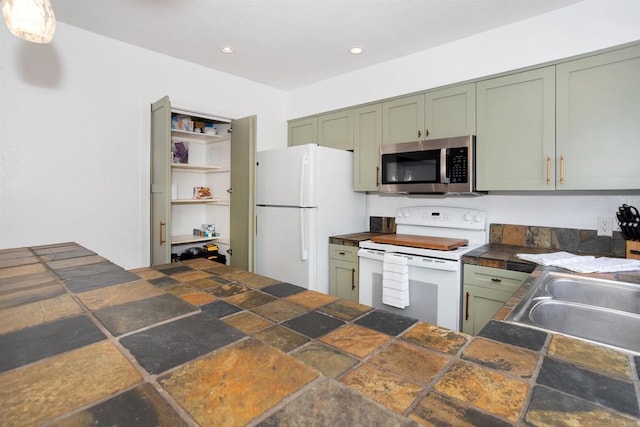 7988 Mission Center Ct Unit H, San Diego, CA 92108 - kitchen featuring white appliances, green cabinets, dark countertops, and recessed lighting