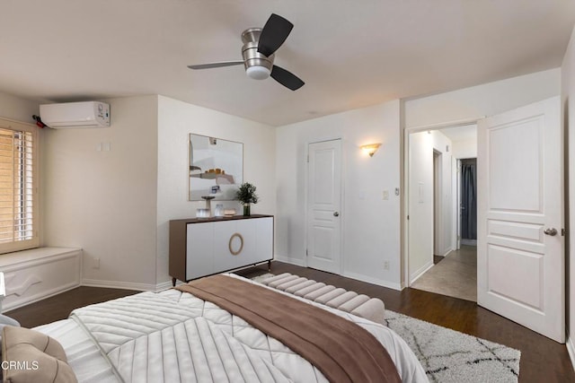 365 Burchett St Unit 112, Glendale, CA 91203 - bedroom featuring a wall mounted air conditioner, dark wood-style flooring, and ceiling fan