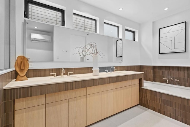 2052 Montgomery Ave, Cardiff By The Sea, CA 92007 - full bathroom with a wall mounted air conditioner, double vanity, a garden tub, and recessed lighting