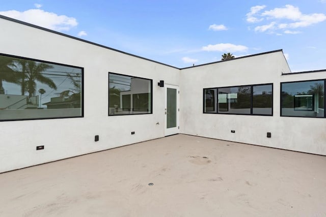 2052 Montgomery Ave, Cardiff By The Sea, CA 92007 - back of house featuring stucco siding, a patio area, and crawl space