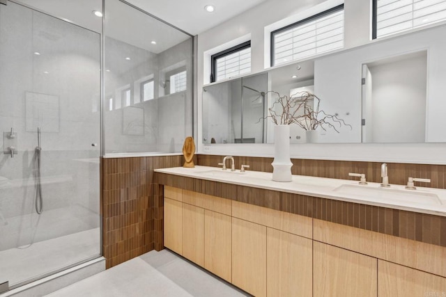 2052 Montgomery Ave, Cardiff By The Sea, CA 92007 - full bath featuring double vanity, a shower with shower door, and tile walls