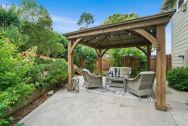 915 Lake Ridge Dr, San Marcos, CA 92078 - fenced backyard featuring an outdoor living space, a patio, and a gazebo