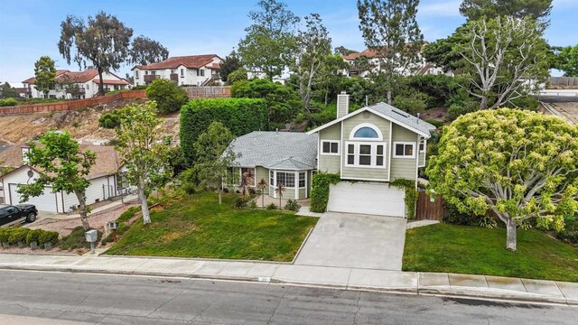 915 Lake Ridge Dr, San Marcos, CA 92078 - view of front of home featuring a garage, concrete driveway, a chimney, and a residential view