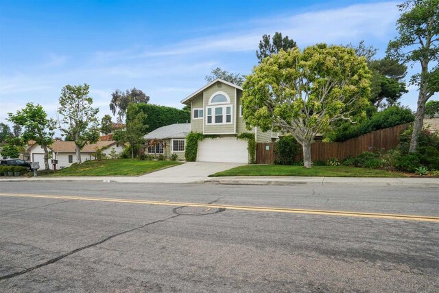 915 Lake Ridge Dr, San Marcos, CA 92078 - traditional-style home featuring an attached garage and concrete driveway