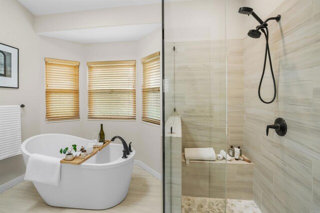 915 Lake Ridge Dr, San Marcos, CA 92078 - bathroom featuring a stall shower and a soaking tub