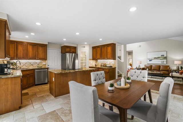 915 Lake Ridge Dr, San Marcos, CA 92078 - dining area with recessed lighting and stone tile flooring