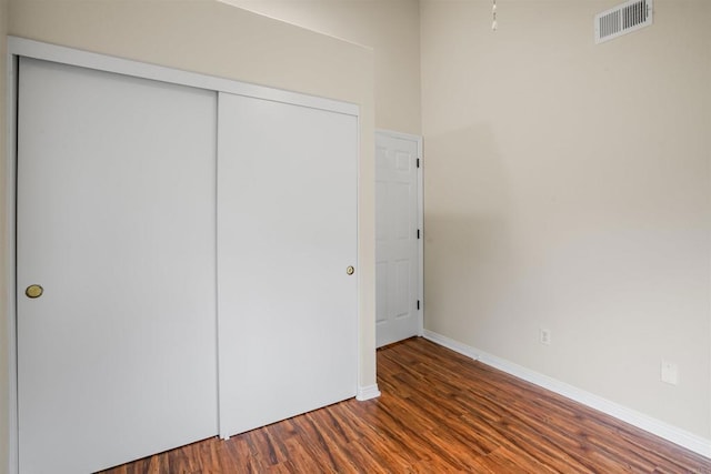 915 Lake Ridge Dr, San Marcos, CA 92078 - unfurnished bedroom with a closet and wood finished floors