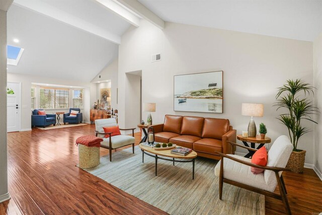 915 Lake Ridge Dr, San Marcos, CA 92078 - living room featuring high vaulted ceiling, wood finished floors, beamed ceiling, and a skylight