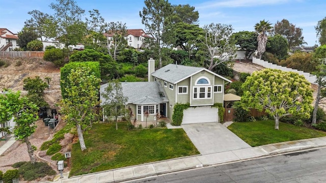 915 Lake Ridge Dr, San Marcos, CA 92078 - view of front of house with driveway, a garage, a chimney, and a shingled roof