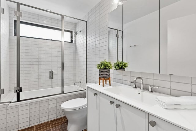 2058 Montgomery Ave, Cardiff By The Sea, CA 92007 - full bath with tiled shower / bath, vanity, decorative backsplash, and tile walls