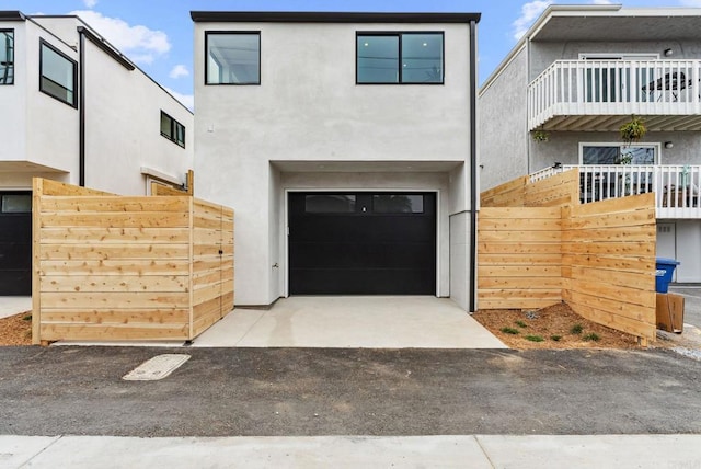 2058 Montgomery Ave, Cardiff By The Sea, CA 92007 - view of front facade with stucco siding, a garage, and asphalt driveway