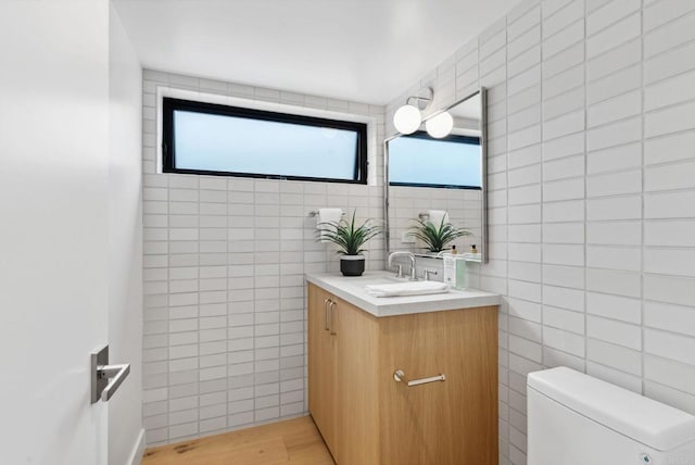 2058 Montgomery Ave, Cardiff By The Sea, CA 92007 - bathroom featuring tile walls, vanity, and wood finished floors