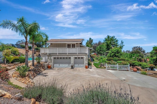 13779 Whispering Meadows Ln, Jamul, CA 91935 - view of front of house with driveway, an attached garage, and stone siding