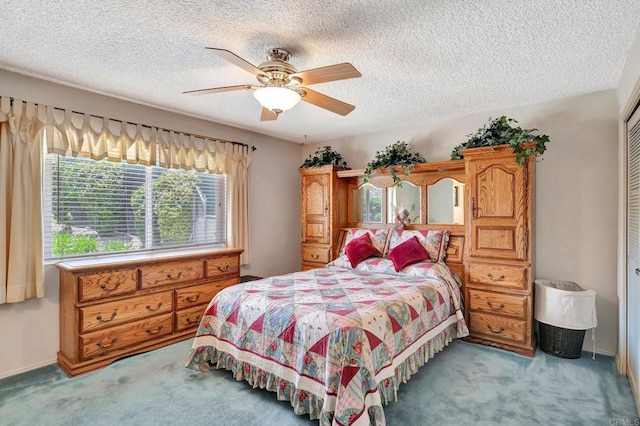 13779 Whispering Meadows Ln, Jamul, CA 91935 - bedroom with light carpet, a closet, a textured ceiling, and a ceiling fan