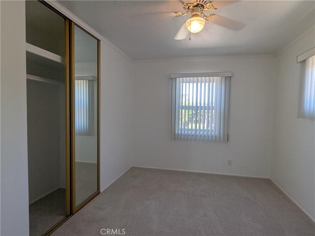 639 Scottdale Ave, Glendora, CA 91740 - unfurnished bedroom featuring a closet, carpet flooring, a ceiling fan, and ornamental molding
