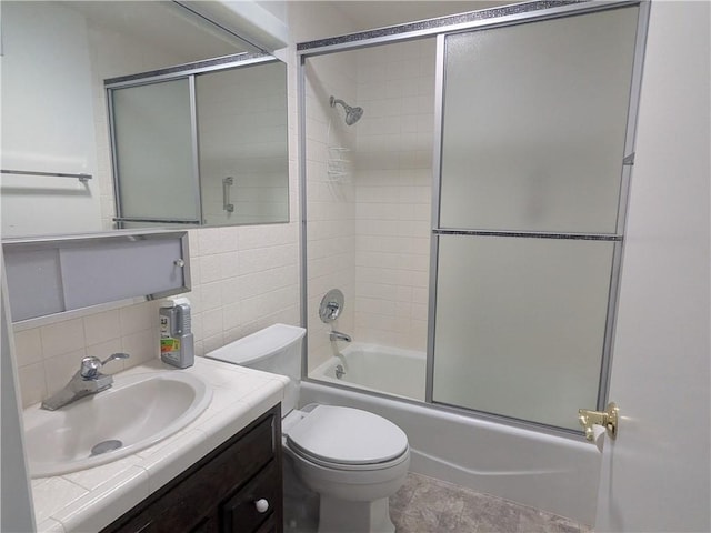 639 Scottdale Ave, Glendora, CA 91740 - full bathroom featuring shower / bath combination with glass door, vanity, backsplash, and tile walls