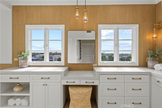 7 Belmont, Newport Beach, CA 92660 - kitchen with light countertops, white cabinets, decorative light fixtures, open shelves, and wood walls