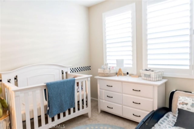 4098 Summer Way, Corona, CA 92883 - bedroom featuring a crib and light colored carpet