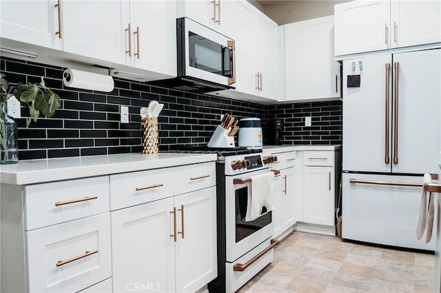 4098 Summer Way, Corona, CA 92883 - kitchen featuring white appliances, white cabinetry, backsplash, and light countertops