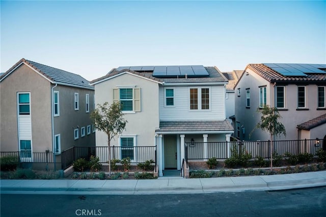 4098 Summer Way, Corona, CA 92883 - view of front of house with solar panels, a tile roof, and stucco siding
