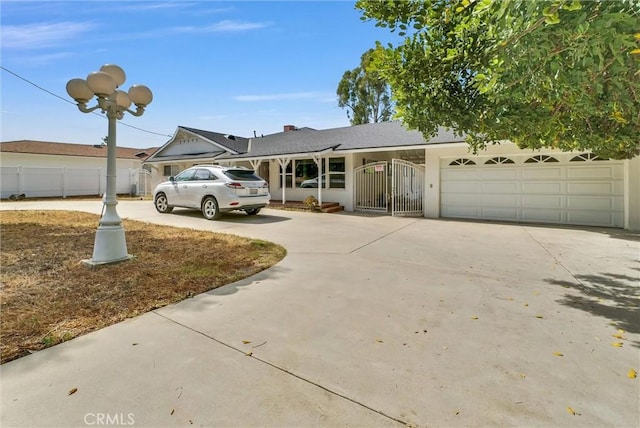 18295 Aguiro St, Rowland Heights, CA 91748 - view of front of house featuring driveway, stucco siding, and an attached garage