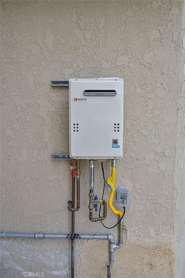4781 Kona Kove Way, Yorba Linda, CA 92886 - exterior view of stucco siding and tankless water heater