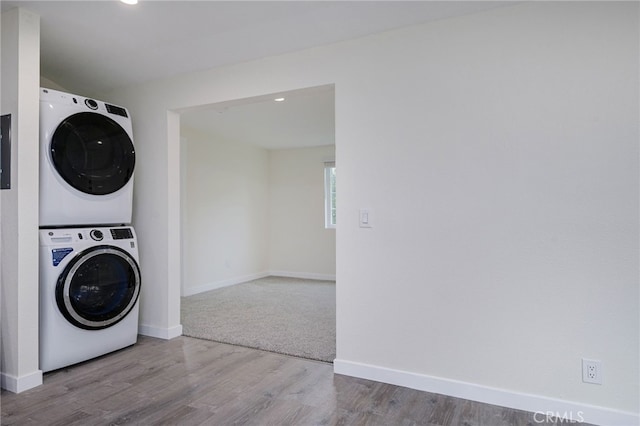 4781 Kona Kove Way, Yorba Linda, CA 92886 - laundry room featuring stacked washer / drying machine, wood finished floors, and recessed lighting