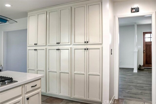 4781 Kona Kove Way, Yorba Linda, CA 92886 - kitchen with recessed lighting, stainless steel gas stovetop, wood finished floors, and light stone countertops