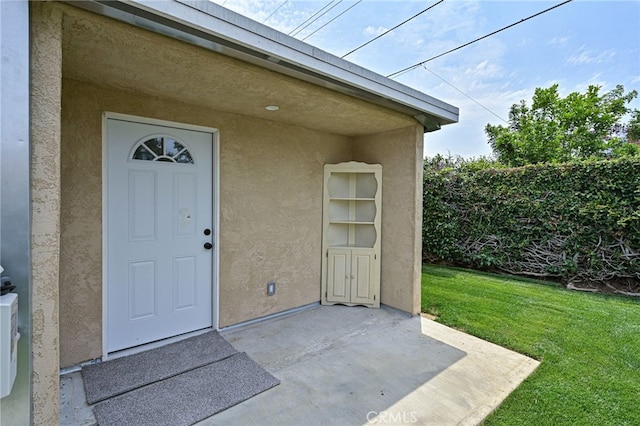 4781 Kona Kove Way, Yorba Linda, CA 92886 - entrance to property with stucco siding and a yard
