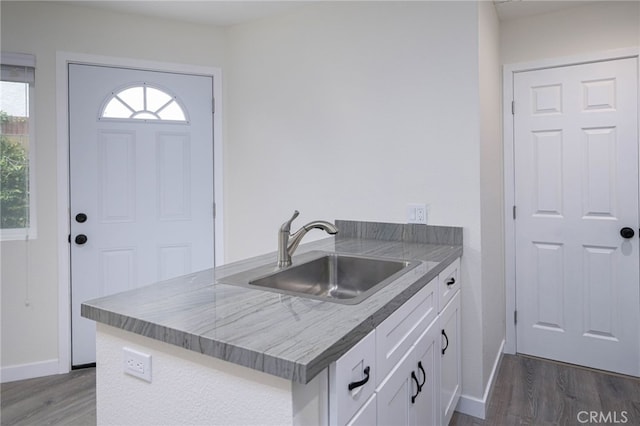 4781 Kona Kove Way, Yorba Linda, CA 92886 - kitchen featuring dark wood-type flooring, white cabinetry, and a peninsula